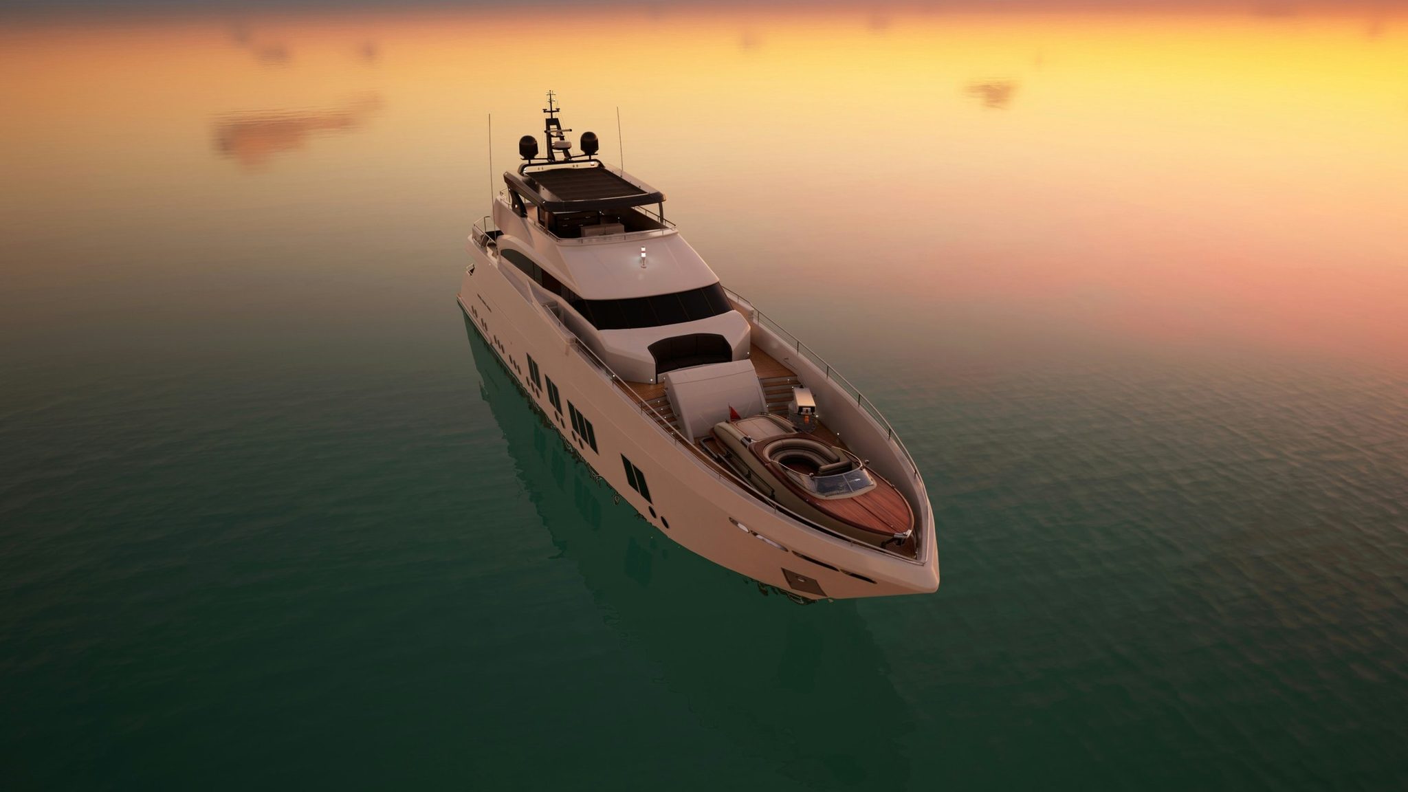 A yacht at sea at sunset