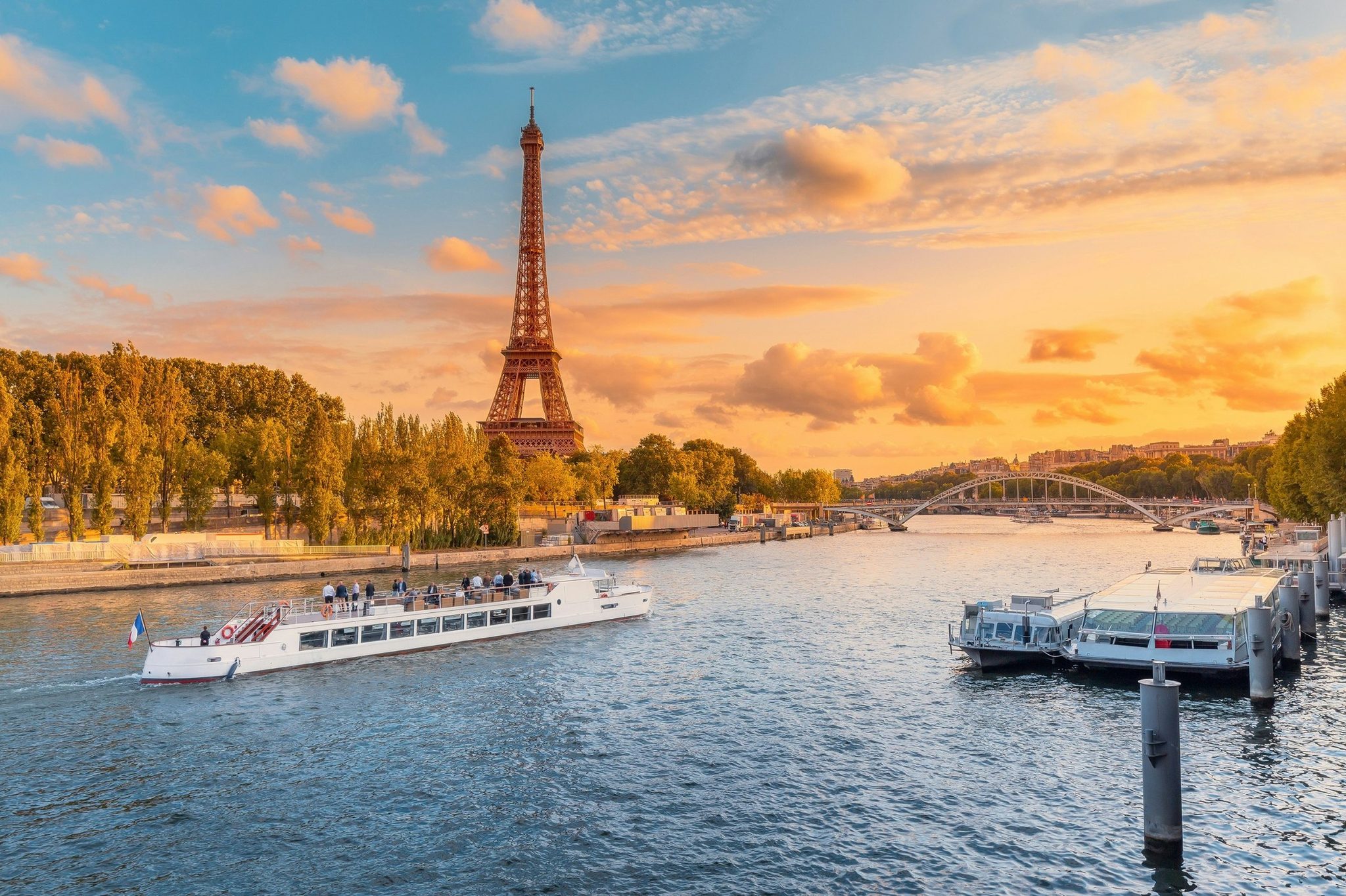The Eiffel Tower and the Seine at sunset